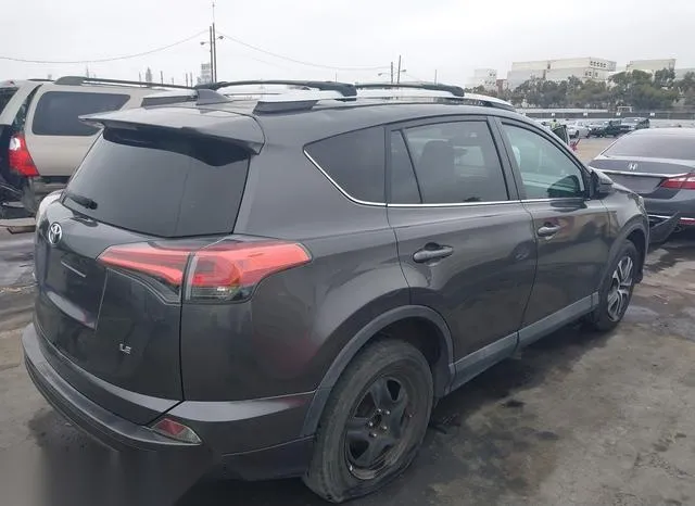 2T3ZFREV1GW273579 2016 2016 Toyota RAV4- LE 4