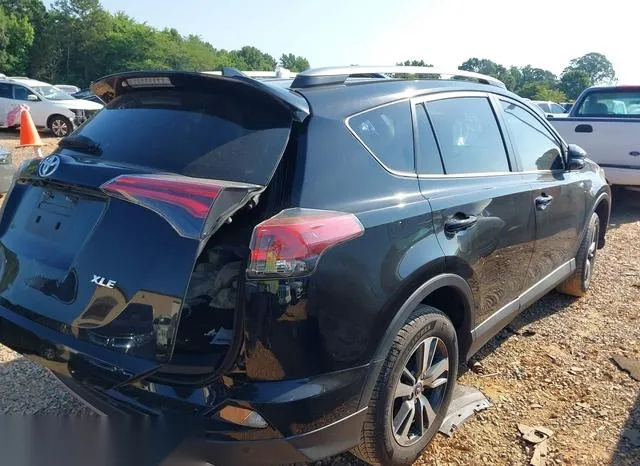 2T3WFREV4JW426482 2018 2018 Toyota RAV4- Xle 4