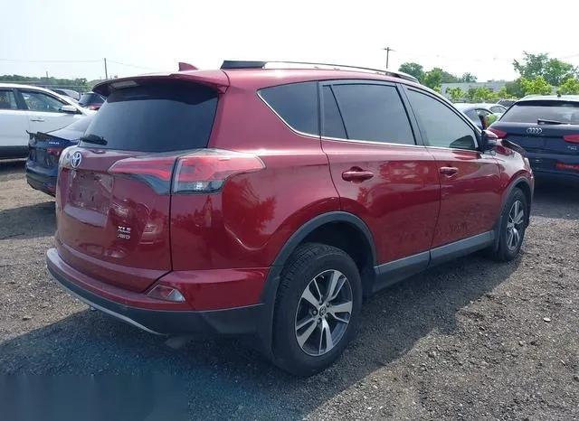 2T3RFREV3JW786047 2018 2018 Toyota RAV4- Xle 4