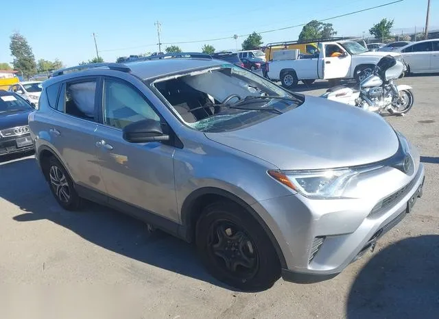 JTMZFREV6JJ162600 2018 2018 Toyota RAV4- LE 1