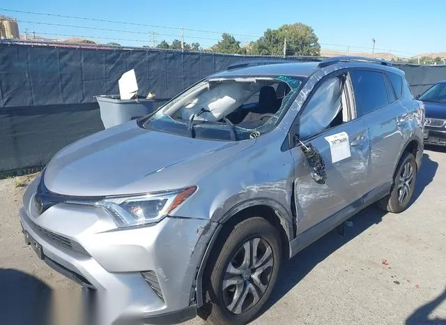 JTMZFREV6JJ162600 2018 2018 Toyota RAV4- LE 6