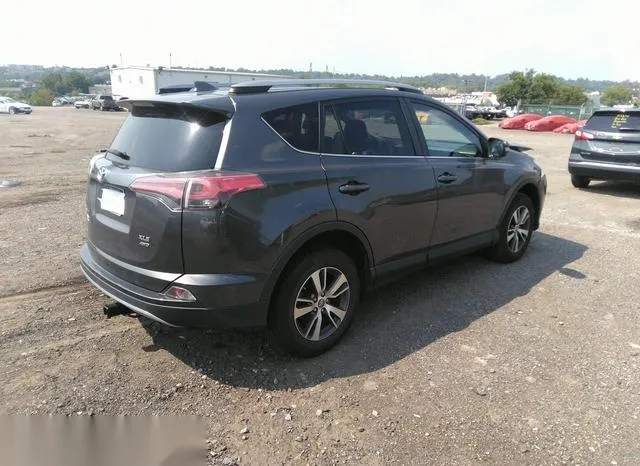 JTMRFREV9JJ205794 2018 2018 Toyota RAV4- Xle 4