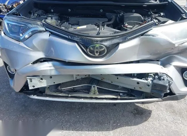 2T3WFREV2JW481612 2018 2018 Toyota RAV4- Xle 6