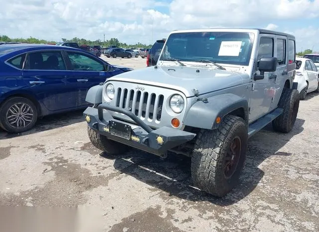 1C4HJWDG3CL259613 2012 2012 Jeep Wrangler- Unlimited Sport 2