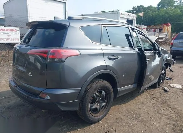 2T3BFREV7JW820086 2018 2018 Toyota RAV4- LE 4