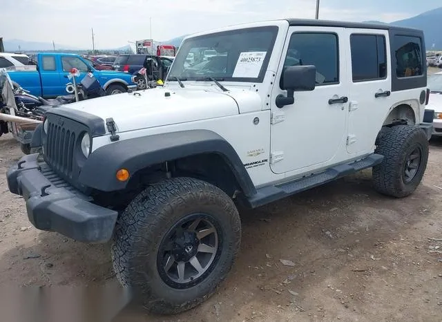 1C4BJWEG6EL243946 2014 2014 Jeep Wrangler- Unlimited Sahara 2