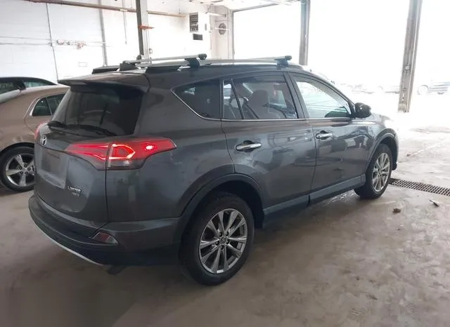 JTMDFREV2GJ083637 2016 2016 Toyota RAV4- Limited 4