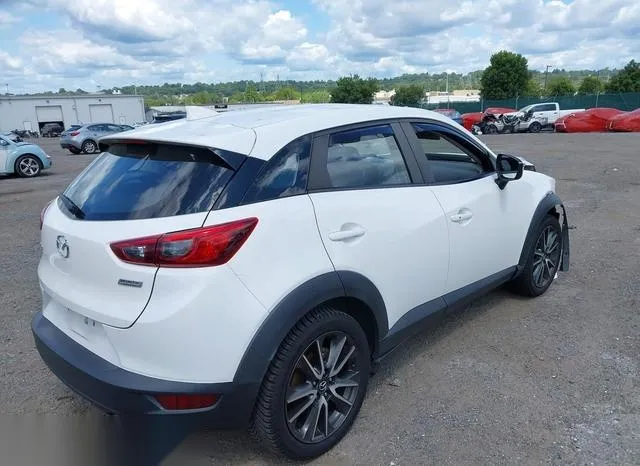 JM1DKFC7XH0169056 2017 2017 Mazda CX-3- Touring 4