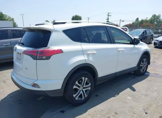 JTMZFREV7JJ738792 2018 2018 Toyota RAV4- LE 4