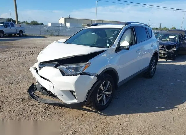 JTMWFREV2JJ186962 2018 2018 Toyota RAV4- Xle 2