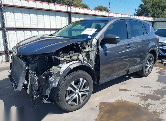 2T3ZFREV6JW414475 2018 2018 Toyota RAV4- LE 2