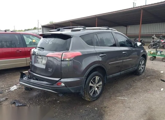 JTMRFREV8JJ736386 2018 2018 Toyota RAV4- Xle 4