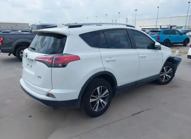 JTMWFREV6HJ714254 2017 2017 Toyota RAV4- Xle 4