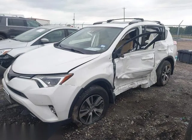 JTMWFREV6JJ723834 2018 2018 Toyota RAV4- Xle 2