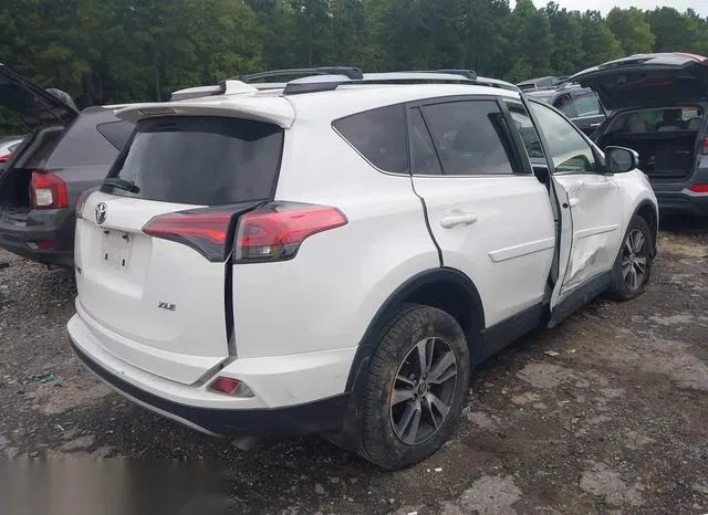 JTMWFREV6JJ723834 2018 2018 Toyota RAV4- Xle 4