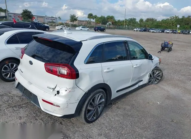 KNDCE3LC5H5040997 2017 2017 KIA Niro- Touring 4