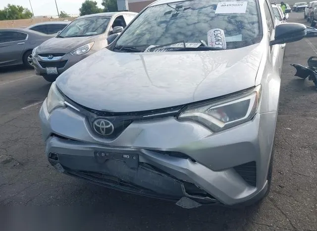 JTMZFREV1JJ158356 2018 2018 Toyota RAV4- LE 6