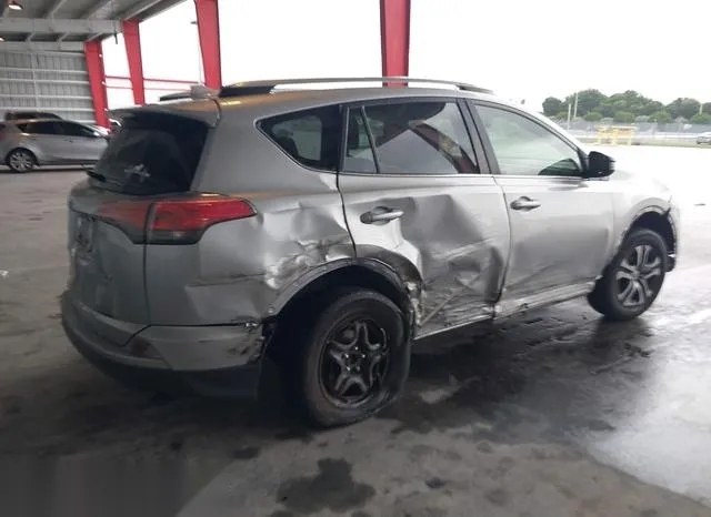 JTMZFREV5JJ196205 2018 2018 Toyota RAV4- LE 4