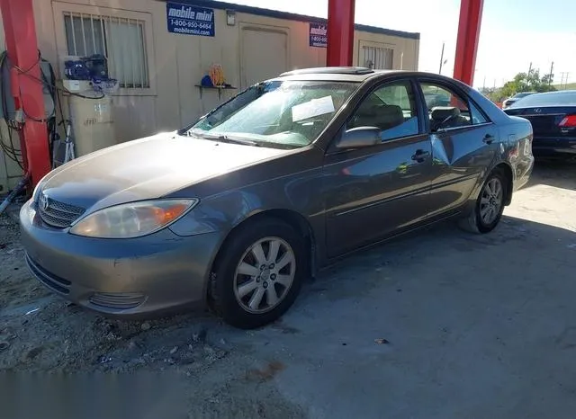 4T1BF30K02U516957 2002 2002 Toyota Camry- Xle V6 2