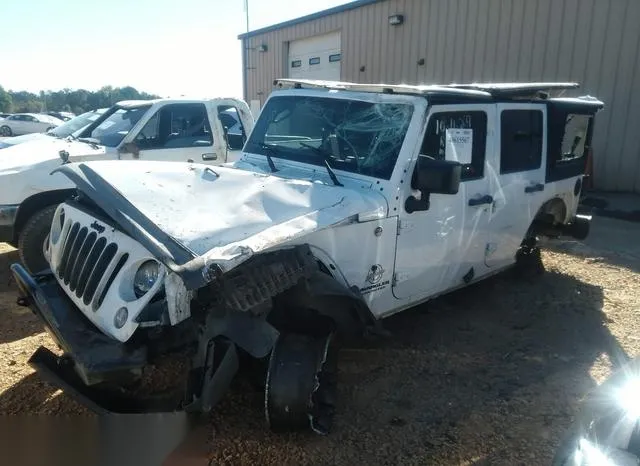 1C4HJWEG5EL256164 2014 2014 Jeep Wrangler- Unlimited Sahara 2