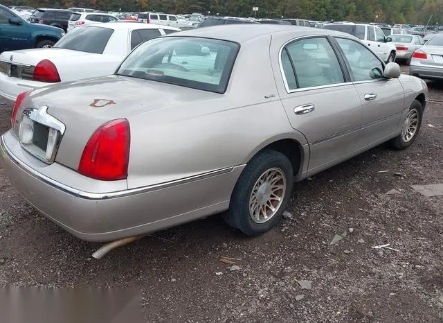 1LNHM82WXYY861055 2000 2000 Lincoln Town Car- Signature 4