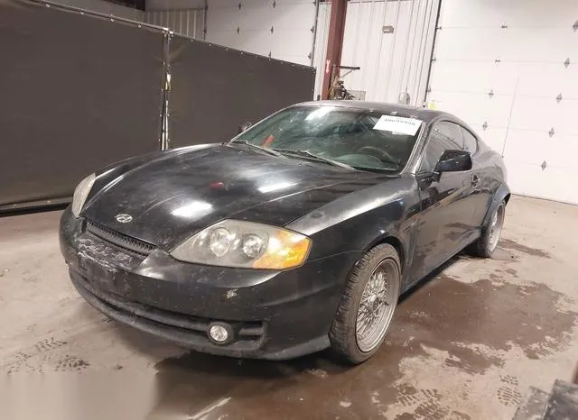 KMHHM65D63U099079 2003 2003 Hyundai Tiburon 2