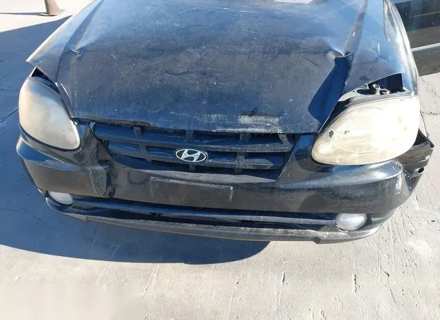 KMHCF35C53U265795 2003 2003 Hyundai Accent 6