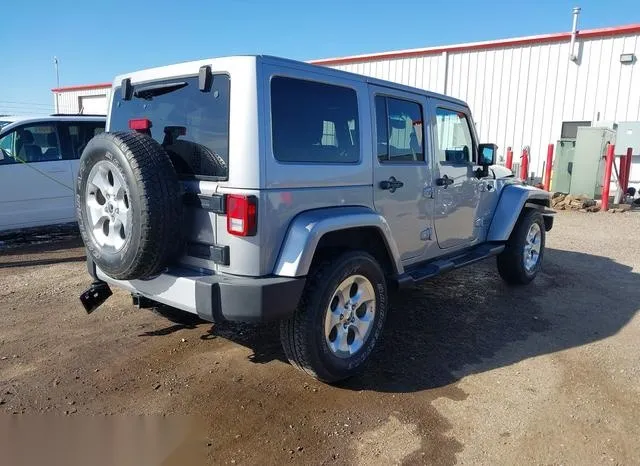 1C4BJWEG7EL204363 2014 2014 Jeep Wrangler- Unlimited Sahara 4