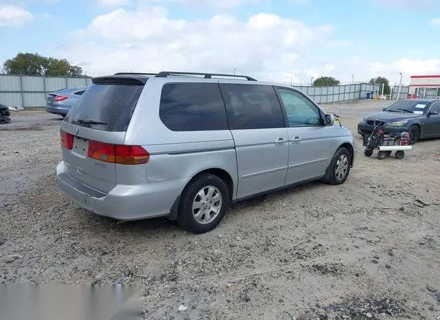 5FNRL18064B091503 2004 2004 Honda Odyssey- Ex-L Res 4