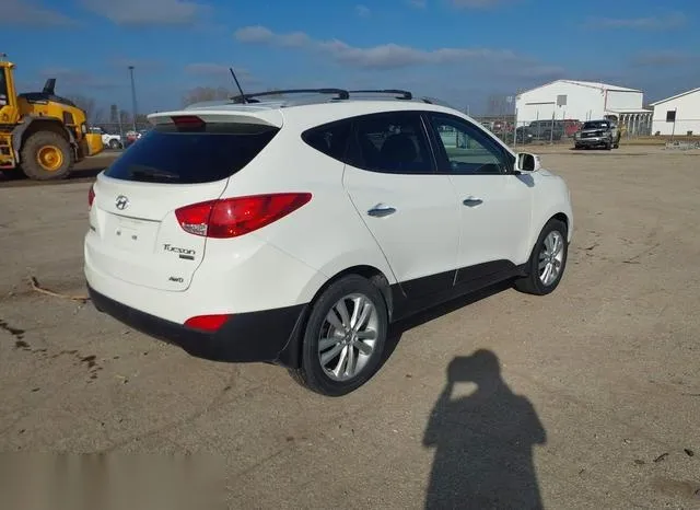 KM8JUCAC9CU355163 2012 2012 Hyundai Tucson- Limited 4