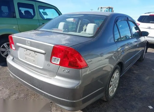 2HGES16524H592318 2004 2004 Honda Civic- LX 4