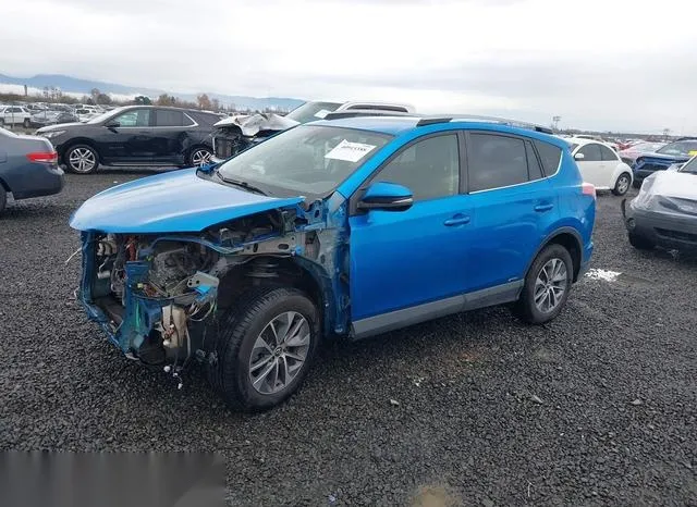 JTMRJREV3JD246242 2018 2018 Toyota RAV4- Hybrid LE 2