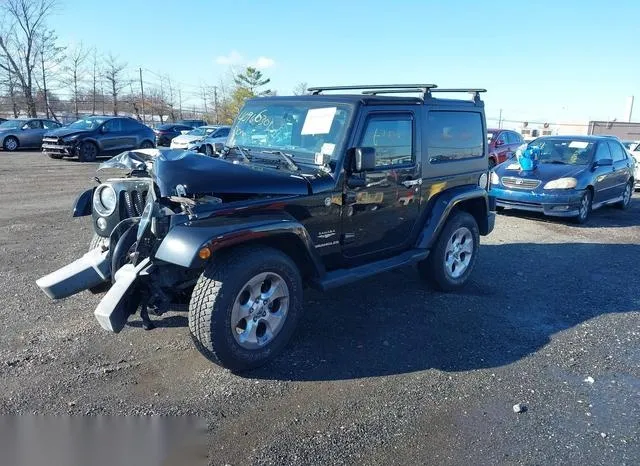 1C4GJWBG4EL257354 2014 2014 Jeep Wrangler- Sahara 2