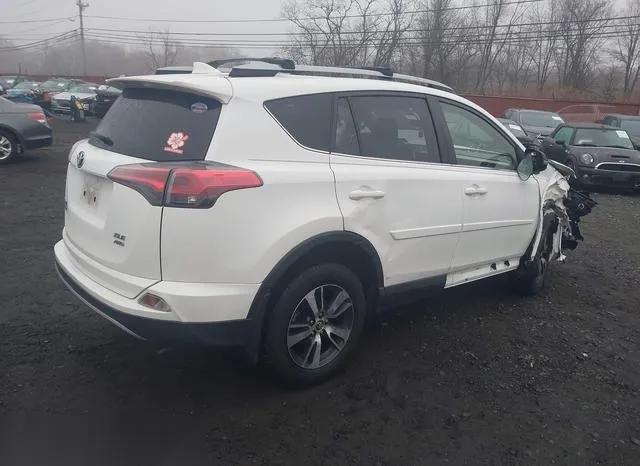 JTMRFREV9HJ706436 2017 2017 Toyota RAV4- Xle 4