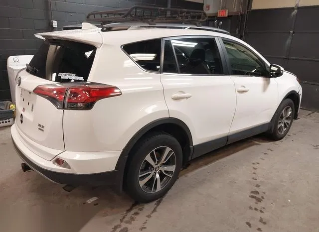 JTMRFREV9HJ713712 2017 2017 Toyota RAV4- Xle 4