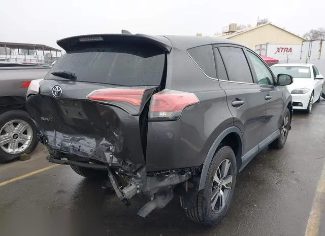 2T3WFREV8JW467651 2018 2018 Toyota RAV4- Xle 4