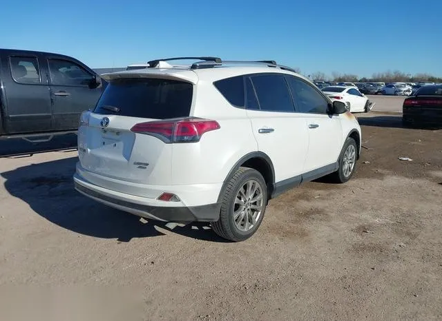 JTMDFREV7GJ059561 2016 2016 Toyota RAV4- Limited 4