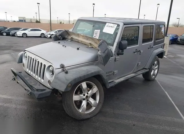 1C4HJWDG2EL140602 2014 2014 Jeep Wrangler- Unlimited Sport 2