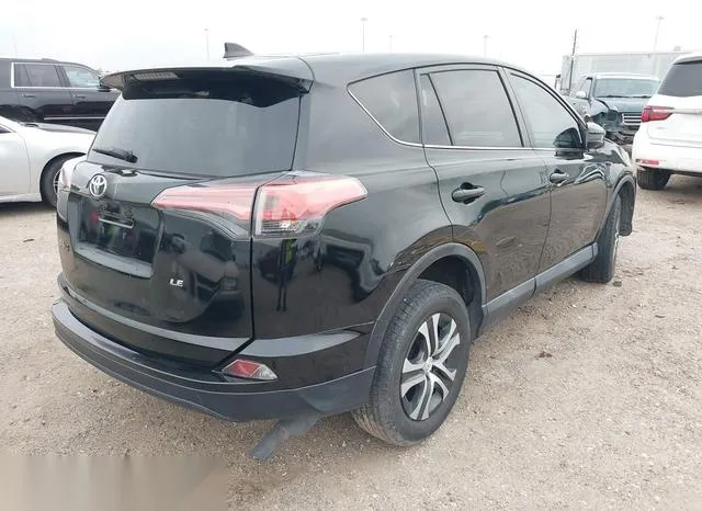 2T3ZFREV9JW440861 2018 2018 Toyota RAV4- LE 4