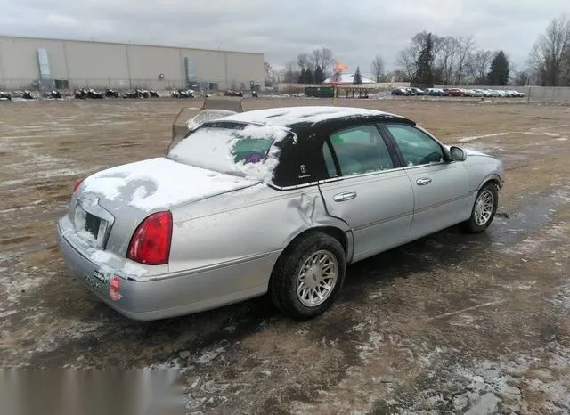 1LNFM82WXWY699044 1998 1998 Lincoln Town Car- Signature 4