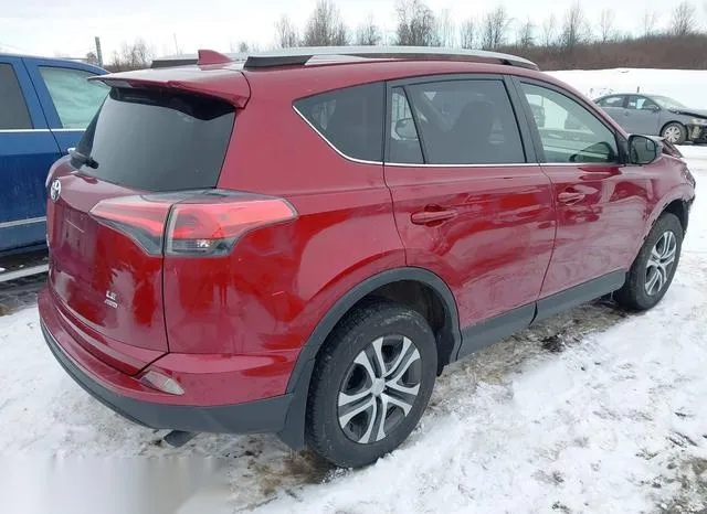 JTMBFREV6JD238719 2018 2018 Toyota RAV4- LE 4