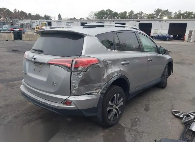 2T3BFREV6JW725180 2018 2018 Toyota RAV4- LE 4