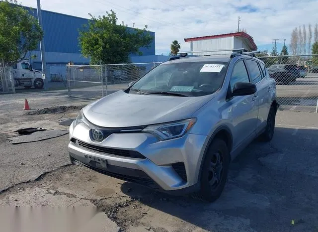 JTMZFREV6JJ204683 2018 2018 Toyota RAV4- LE 2