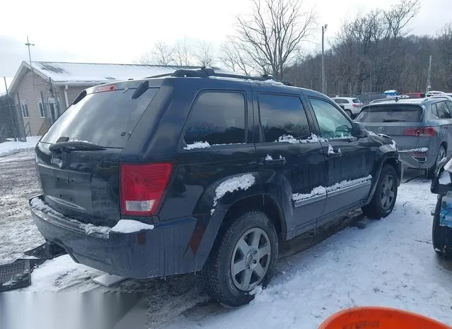 1J8GR48K59C555077 2009 2009 Jeep Grand Cherokee- Laredo 4