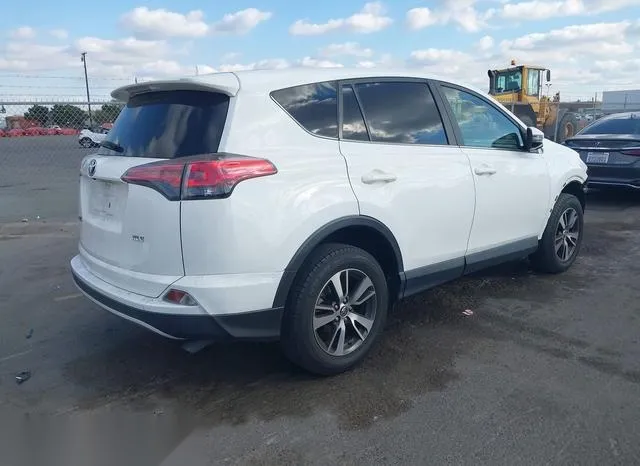 JTMWFREV5HJ144716 2017 2017 Toyota RAV4- Xle 4