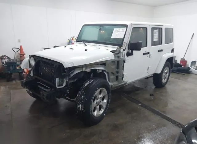 1C4BJWEG1DL663029 2013 2013 Jeep Wrangler- Unlimited Sahara 2