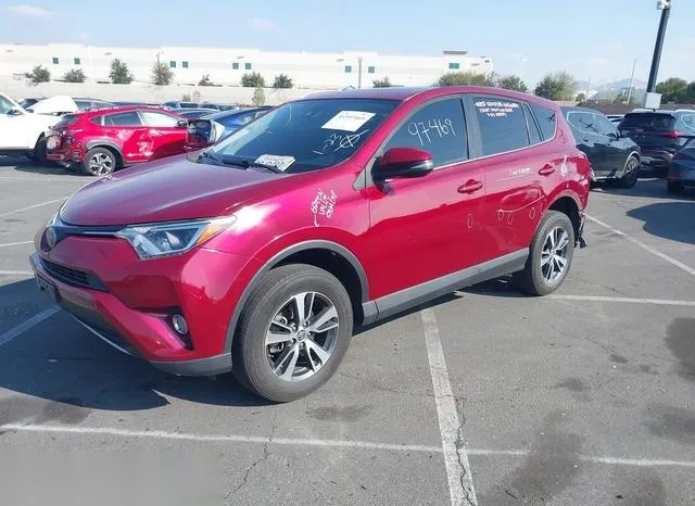 JTMWFREV6JD112328 2018 2018 Toyota RAV4- Xle 2