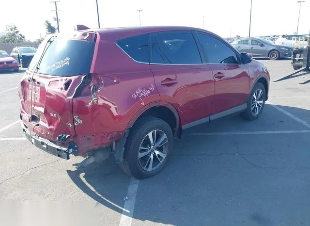 JTMWFREV6JD112328 2018 2018 Toyota RAV4- Xle 4