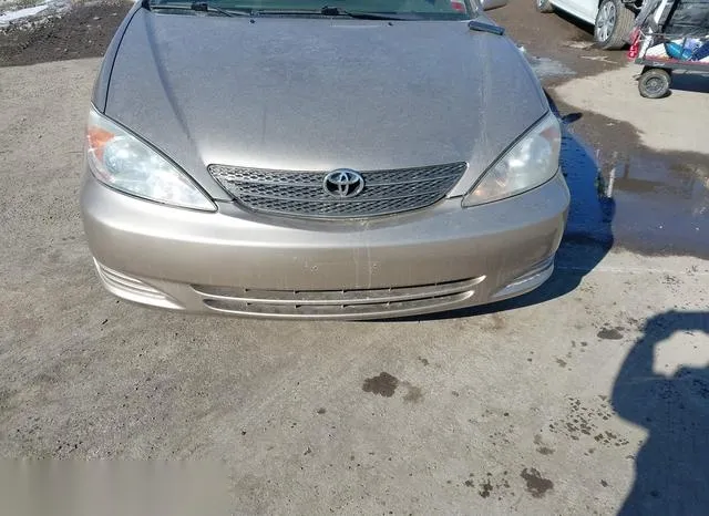 4T1BE30K42U104687 2002 2002 Toyota Camry- Xle 6