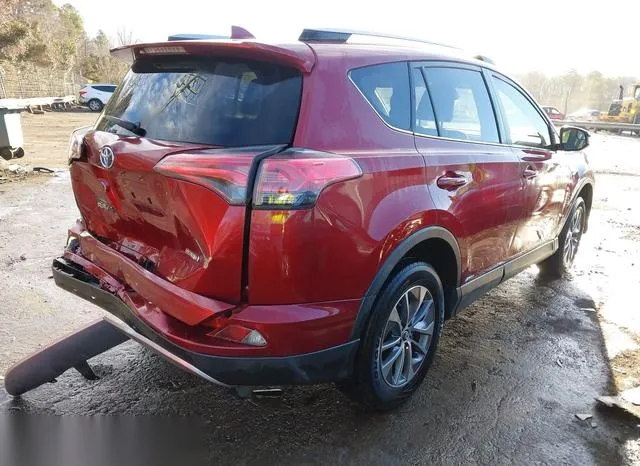 JTMRJREV2JD181383 2018 2018 Toyota RAV4- Hybrid LE 4